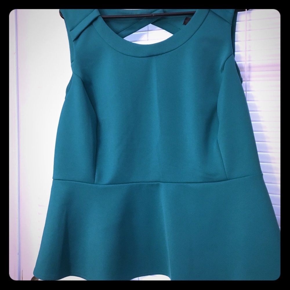 Blue green peplum top in scuba material